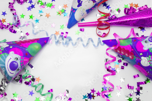 Greeting card for carnival party.  hat and candles on white background. photo