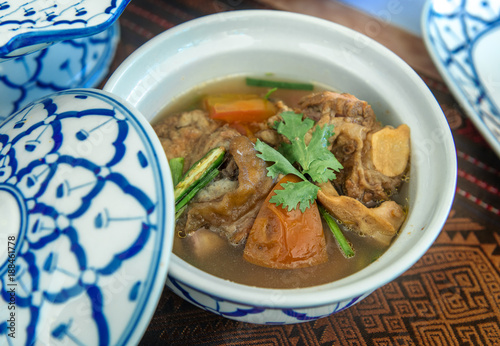 Pork boiled gravy suop with heabs,Thai traditional,Thai food photo