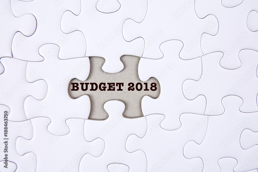 Business concept: Missing jigsaw puzzle with word BUDGET 2018. Business concept: Missing jigsaw puzzle with word BUDGET 2018.