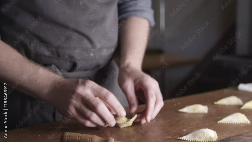Homemade ravioli on counter, slow motion Homemade ravioli on counter, slow motion