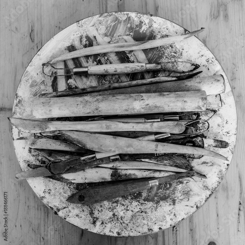 Collection of dirty clay sculpting tools