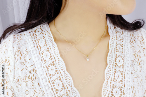 A woman with a Pearl Necklace