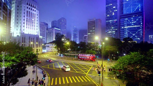 Ifc Tower, Trams, Buses & Traffic; Skysrapers & Junction At Night; Queensway & Des Voeux Road, Hong Kong, China photo