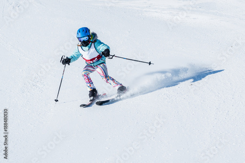 People are having fun in downhill skiing and snowboarding 
