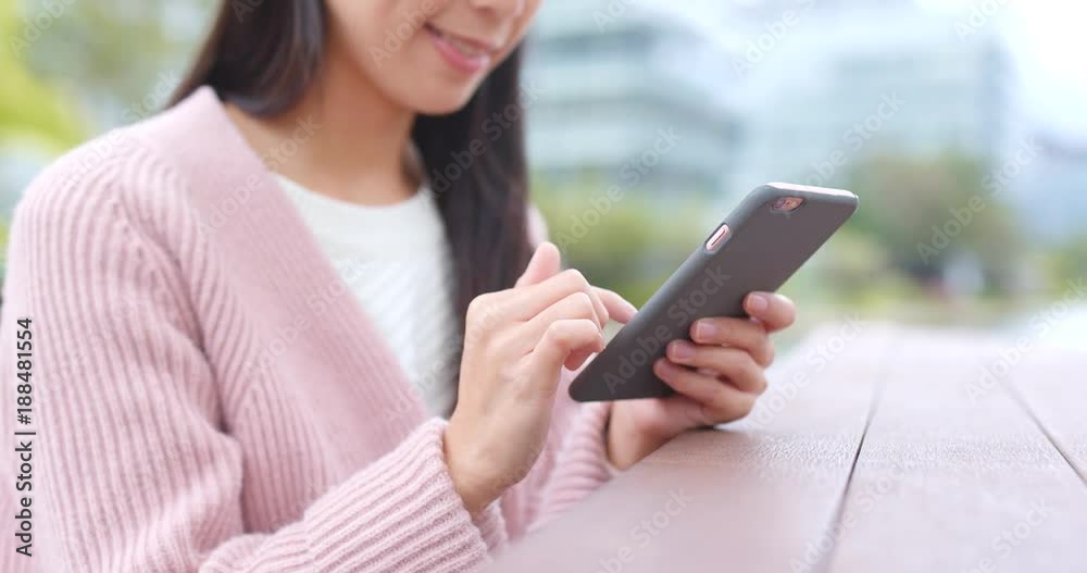 Using mobile phone at outdoor Using mobile phone at outdoor