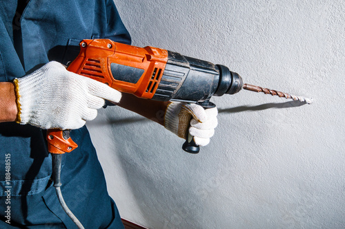 man with electric drill photo