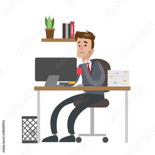 Tired businessman at office.