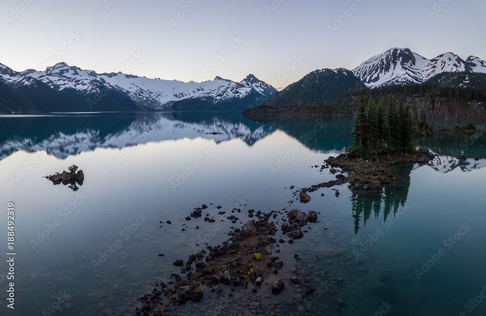 Aerial panoramic view of a beautiful glacier lake in Canadian Mountain Landscape. Taken in Garibaldi, near Squamish and Whistler, North of Vancouver, BC, Canada.
