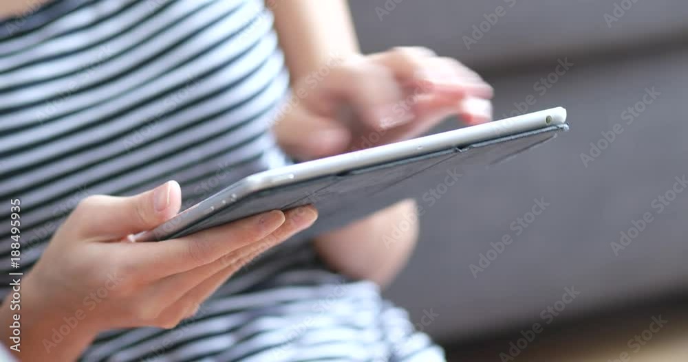 Woman touch on tablet computer Woman touch on tablet computer