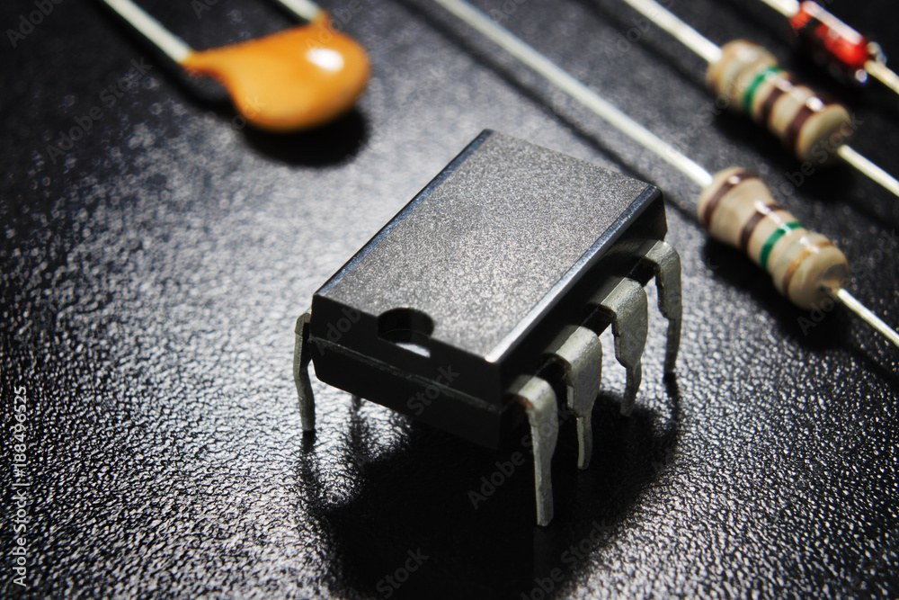 The chip in the housing DIP 8 on a dark background.