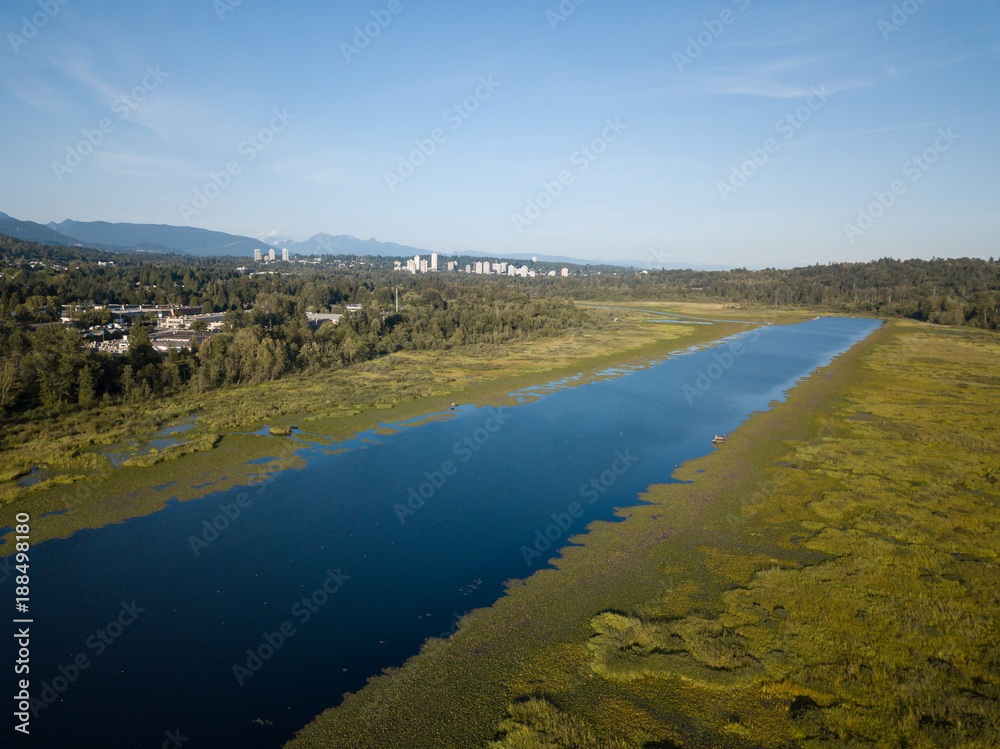 Aerial view of Burnaby Lake during a sunny day in Vancouver, BC, Canada.