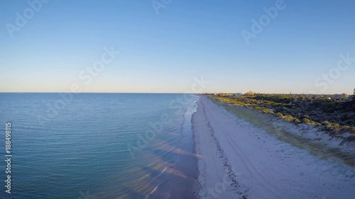Wallpaper Mural Early morning aerial view of  South Australian beach with sun rising over Adelaide Hills and West Lakes, and Tennyson homes overlooking the sea. Torontodigital.ca