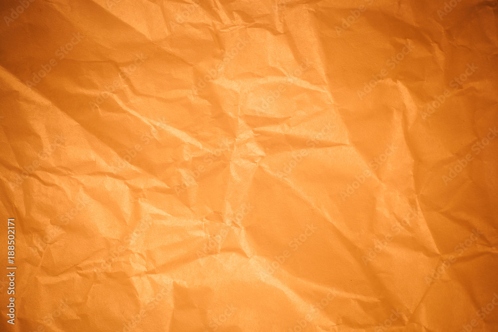 Brown crumpled paper background. Brown crumpled paper background.
