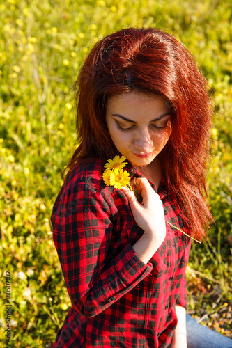 Young woman and flowers