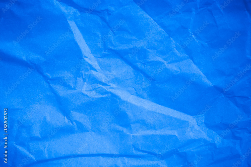 Crumpled blue paper background. Crumpled blue paper background.