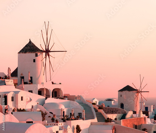 Classic landscape in Oia on Santorini island, Greece at sunset