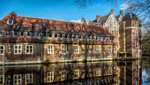 Senden, Coesfeld, Musterland December 2017 - Watercastle Wasserschloss Schloss Senden during sunny day in Winter photo