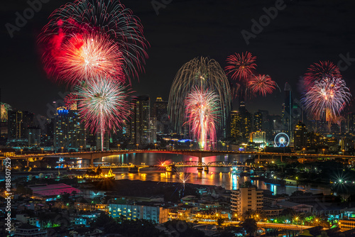 Celebration fireworks countdown   Happy new year bangkok countdown 2018  Colorful of fireworks on the river at night with city background  Bangkok  Thailand.