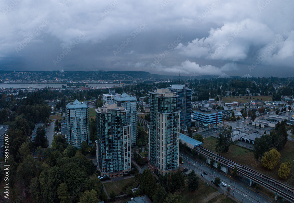 Fototapeta premium Aerial panoramic view of Surrey City in Greater Vancouver, British Columbia, Canada. Taken during a rainy evening.