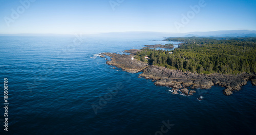 Aerial panoramic landscape view of the rocky Pacific Ocean Coast during a vibrant summer morning. Taken in Ucluelet, Vancouver Island, British Columbia, Canada. 