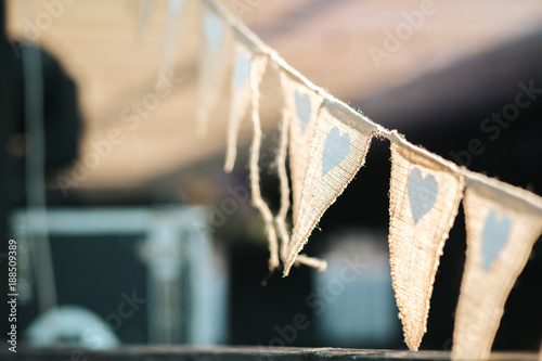 Closeup shot of the rustiс wedding decoration elements  at daylight photo