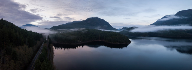 Aerial Drone Panoramic View of the Beautiful Canadian Landscape during a cloudy sunset. Taken in Vancouver Island, British Columbia, Canada.