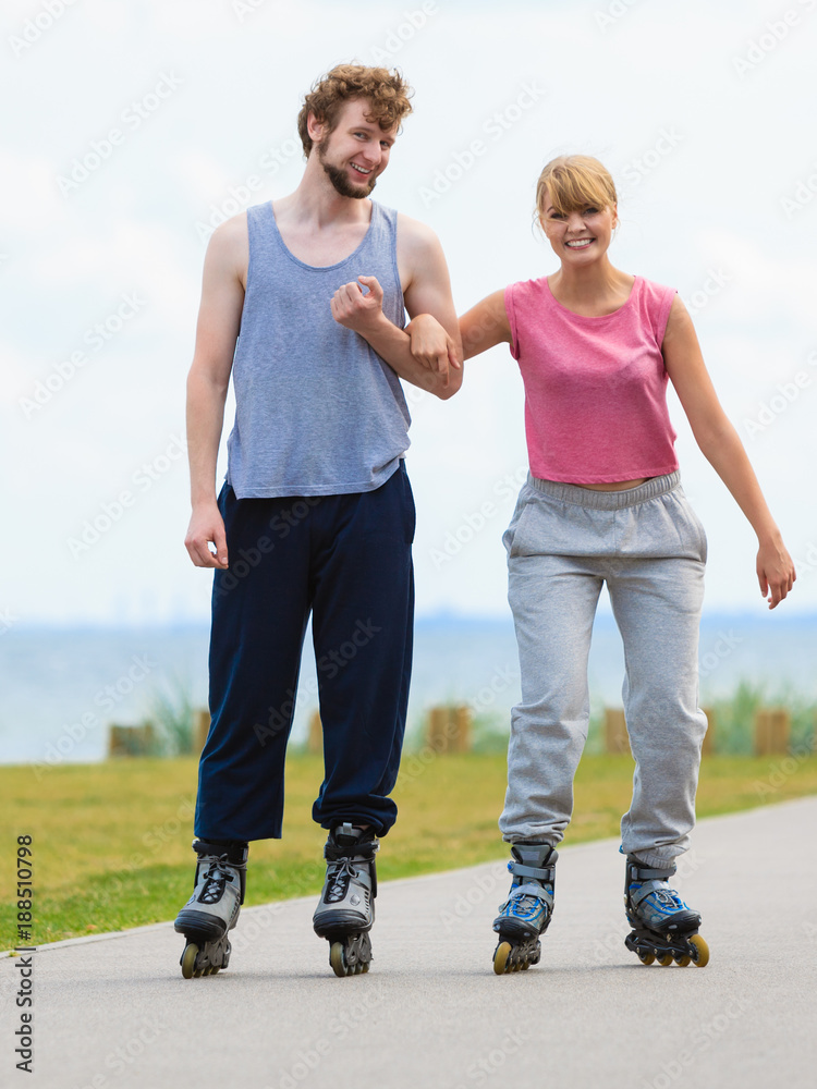 roller skater couple skating outdoor roller skater couple skating outdoor