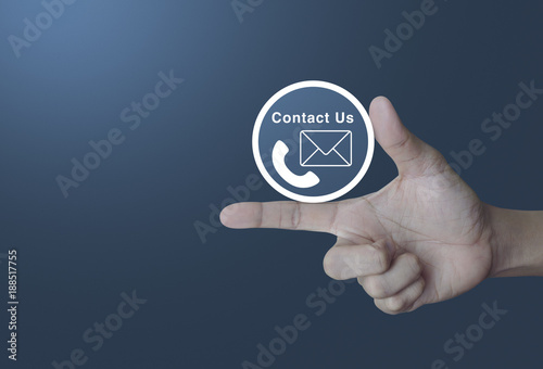 Telephone and mail icon button on finger over light gradient blue background, Contact us concept