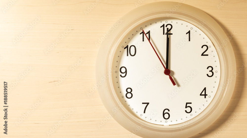 Clock ticking showing twelve hours Clock ticking showing twelve hours