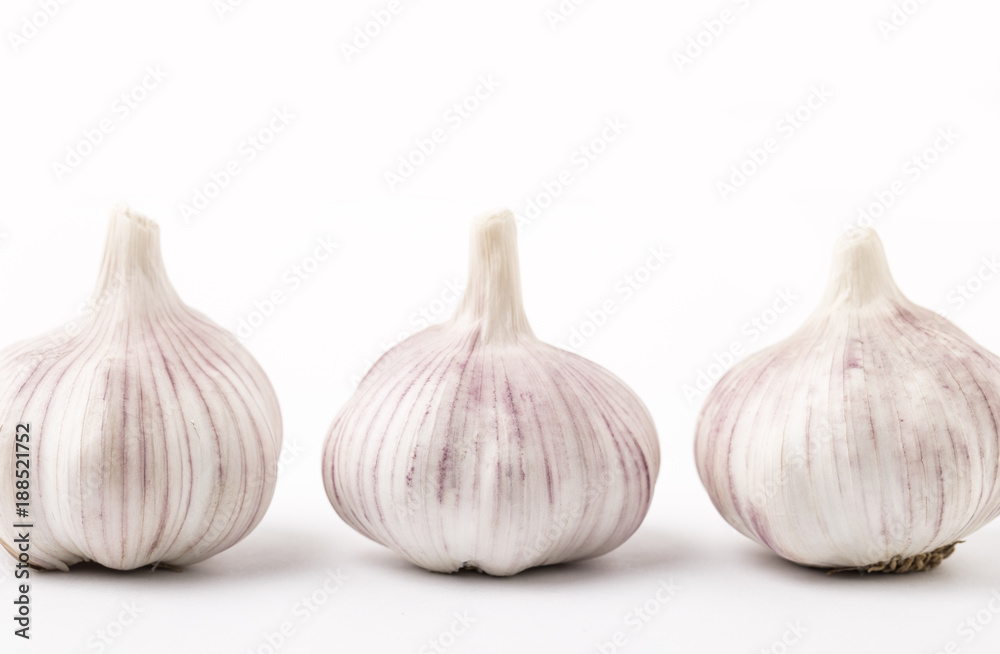 Fresh garlic isolated on white background. Raw garlic Fresh garlic isolated on white background. Raw garlic