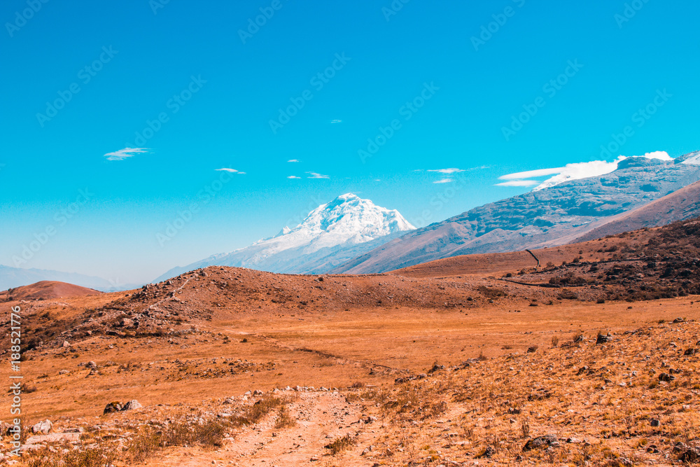 Mountain scenery. Meadows and snow-capped mountains Mountain scenery. Meadows and snow-capped mountains