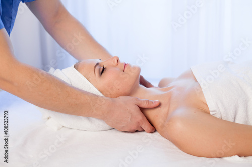 girl masseur doing massage in spa health