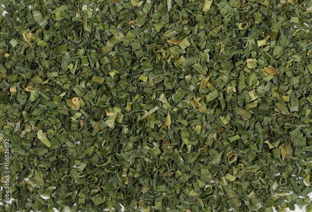 Dry chives pile, allium tuberosum, texture and background, top view Dry chives pile, allium tuberosum, texture and background, top view
