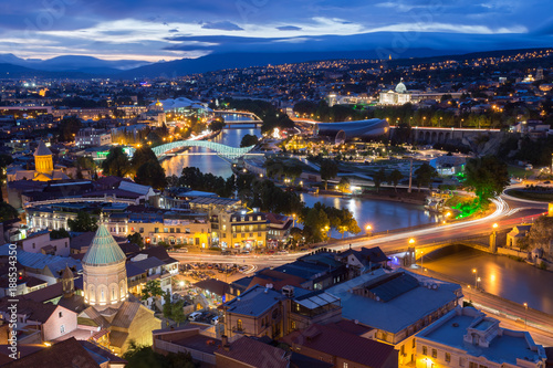 Scenic Top View Of Tbilisi Georgia In Evening Lights Illumination