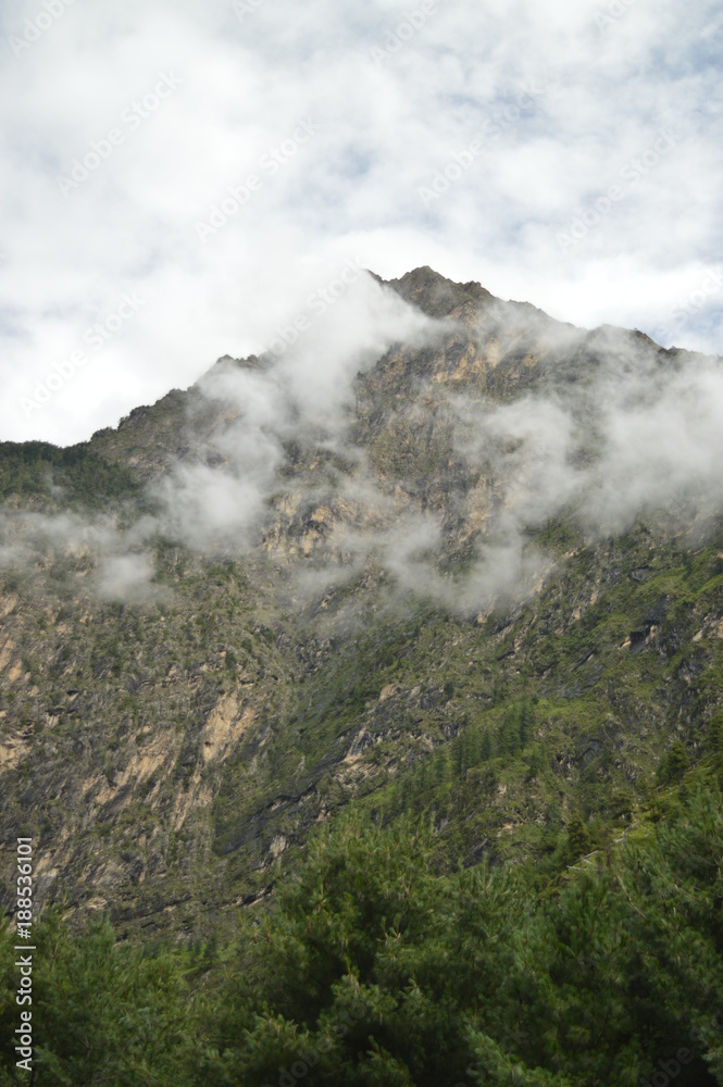 Clouds hanging around Mountain Clouds hanging around Mountain
