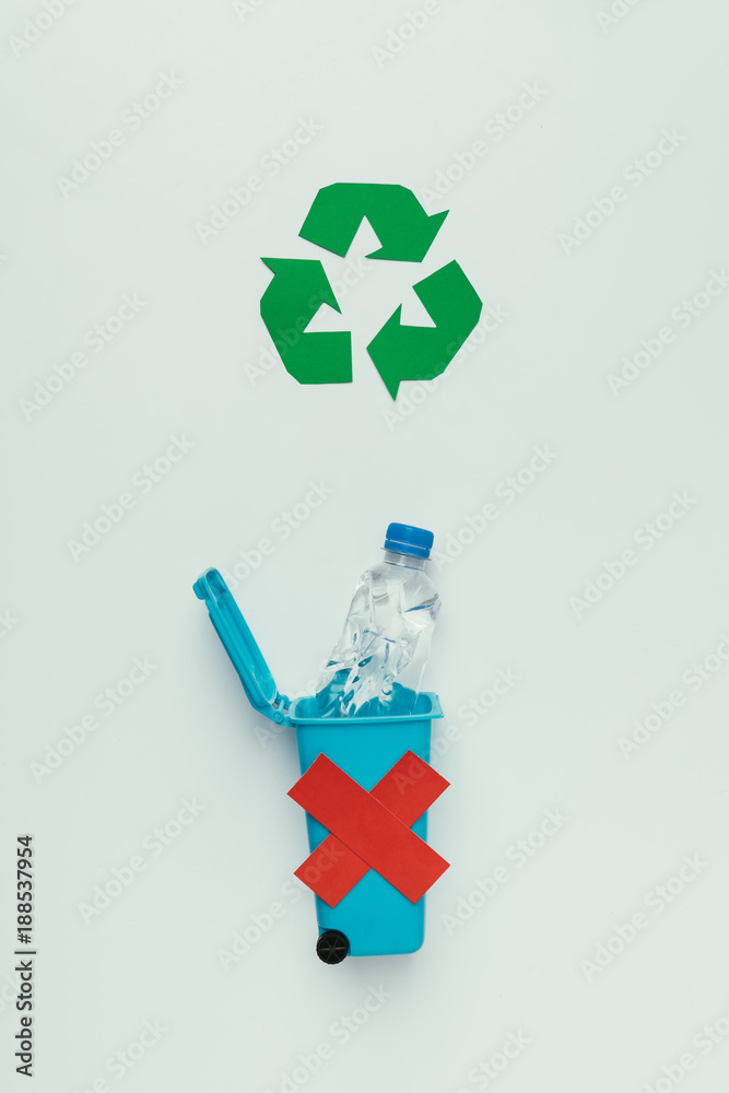 Leeds Assassin længde top view of recycle sign, trash bin with red cross and plastic bottle  isolated on grey, recycling concept Stock Photo | Adobe Stock