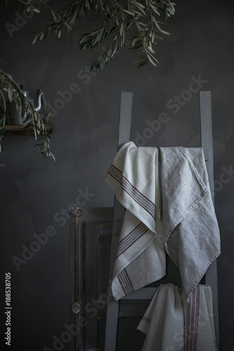 White cloth hanging on chair