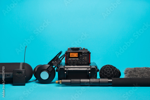 Фотография equipment for field audio recording on blue background