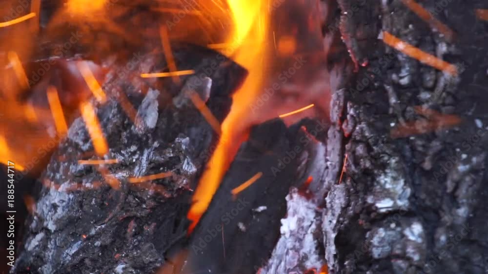 Wood burning in a cast iron grill