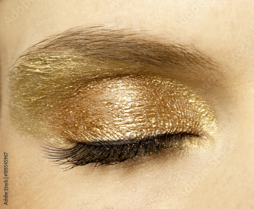 brilliant gold and metallic eyeshadow close