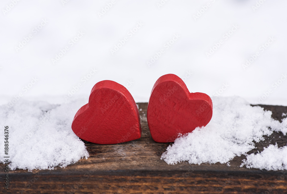 Fototapeta premium two red wooden hearts