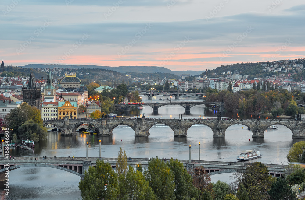 Prague, Czech Republic - October 6, 2017: Gorgeous view on Prague city center, Vltava river and cascade of bridges, Czech Republic. Autumn Prague.