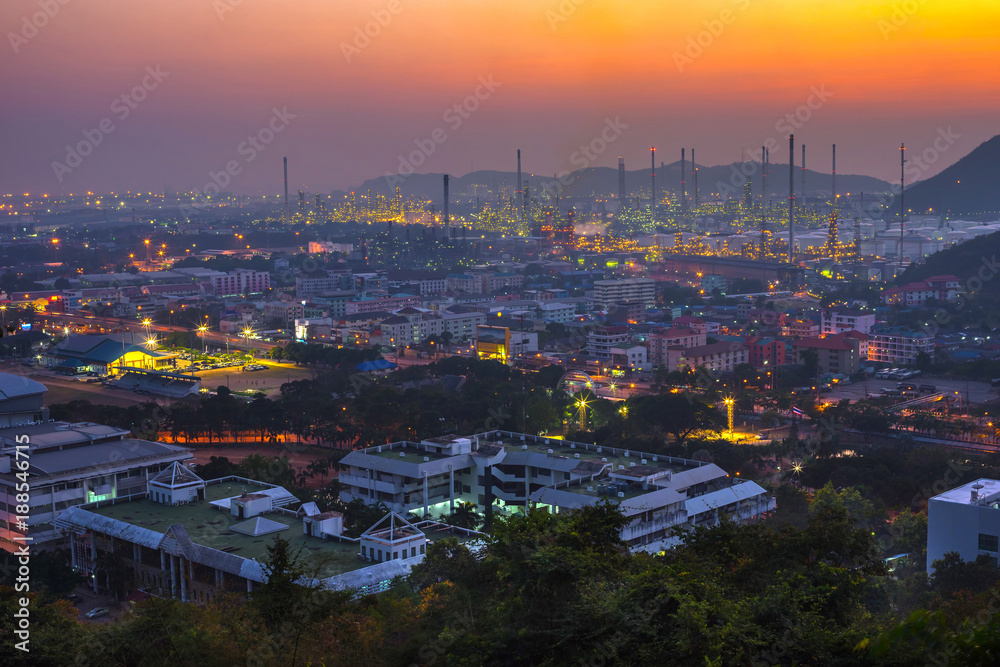 Petrochemical plant in the twilight time at Leamchabung Industrial Estate in Thailand that looking from the mountain and shooting by Telephoto lens.