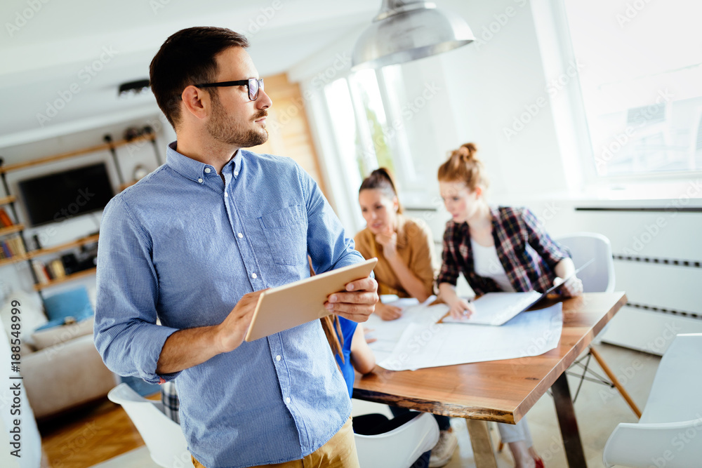 Obraz premium Group of architects working on project