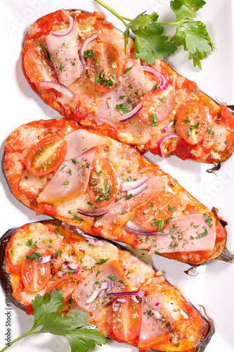eggplant pizza with ham and tomato