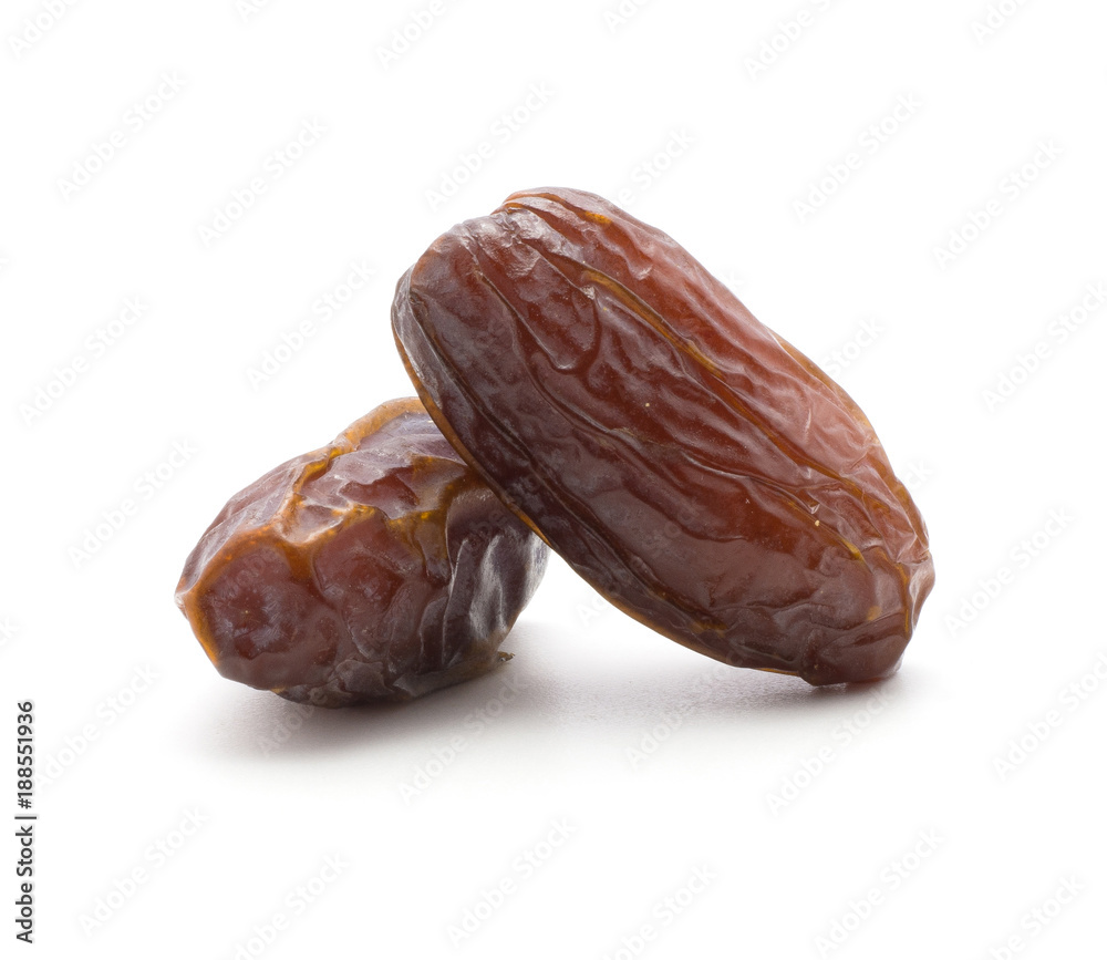 Two date fruits Medjool isolated on white background ripe and dried. Two date fruits Medjool isolated on white background ripe and dried.