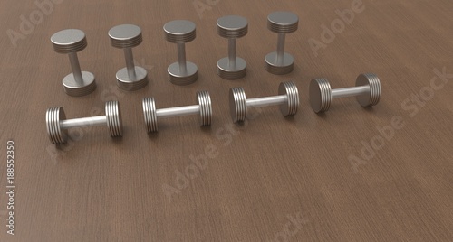 Dumbbells or scales on a wooden floor. Training Concept. . 3D rendering