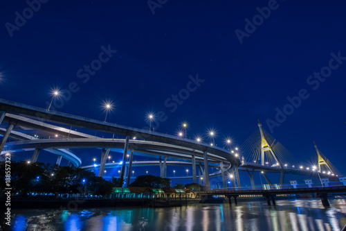Bhumibol Bridge (Industrial Ring Road Bridge) in Bangkok ,Thailand with twilight background © MIKITO