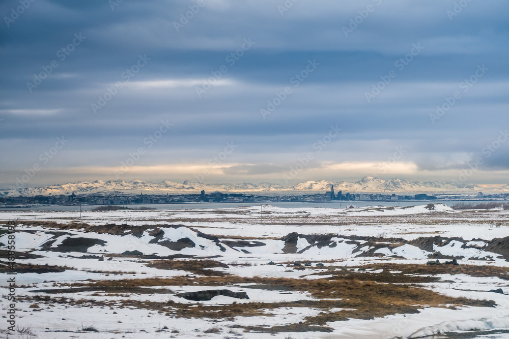 eautiful view and Winter Landscape picture of Iceland winter season with snow-capped mountain in the background