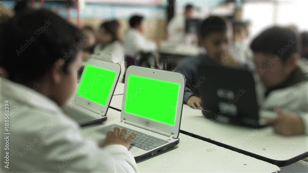 Primary Students Using Laptops Green Screen in Classroom. You can ...